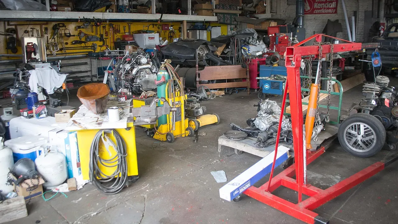 Workbenches and machinery inside an engine fabrication shop