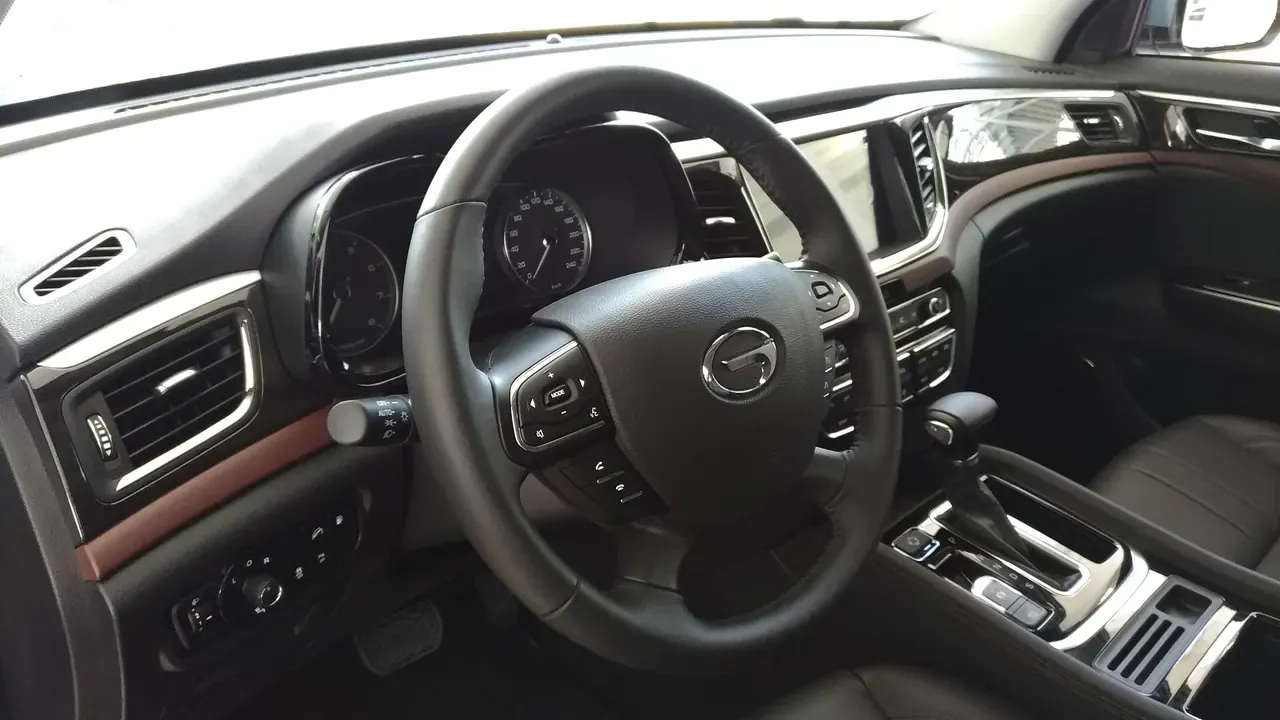 The clean front seats and dashboard of a modern SUV
